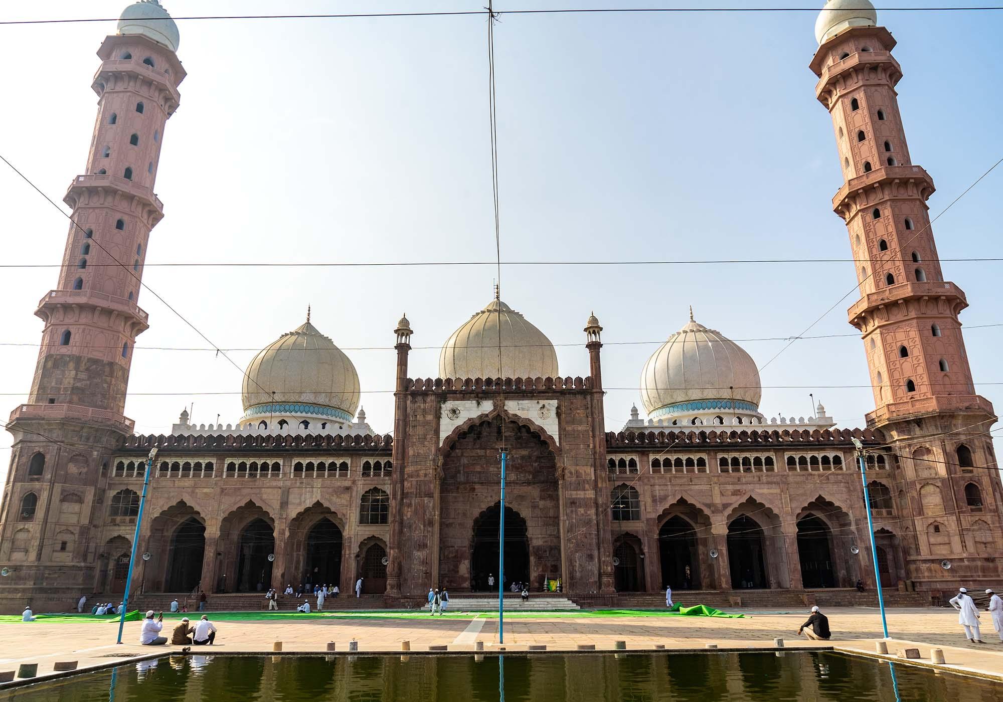The main entrance to the Taj-ul-Masajid mosque, which is built with red sandstone and is one of the largest mosques in India. – © Michael Turtle