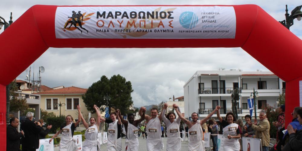 The runners finish the race in Olympia and spread their message to the world. – © Nansy Spyropoulou / Patris Newspaper