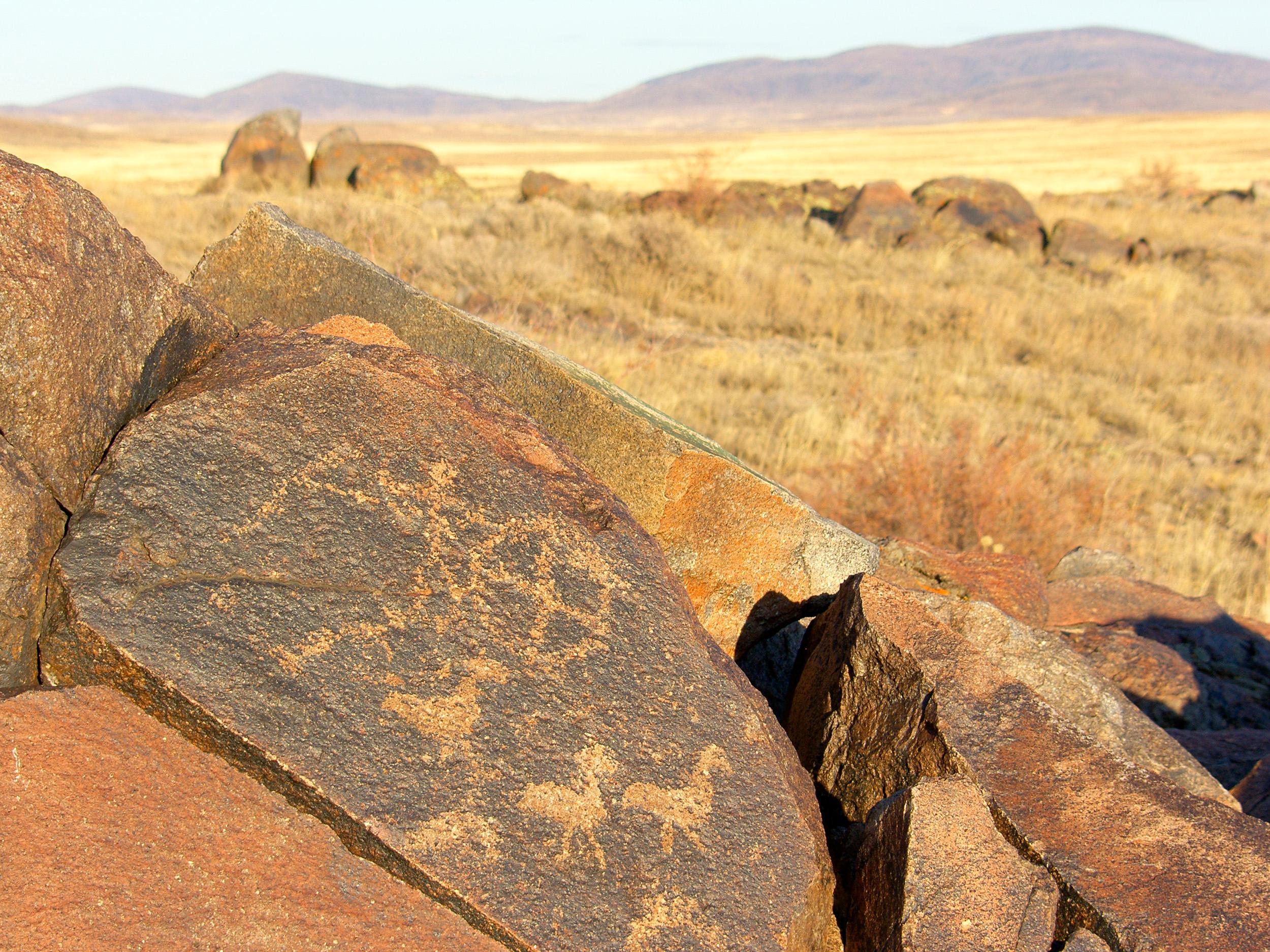 Ancient rock carvings from early nomads