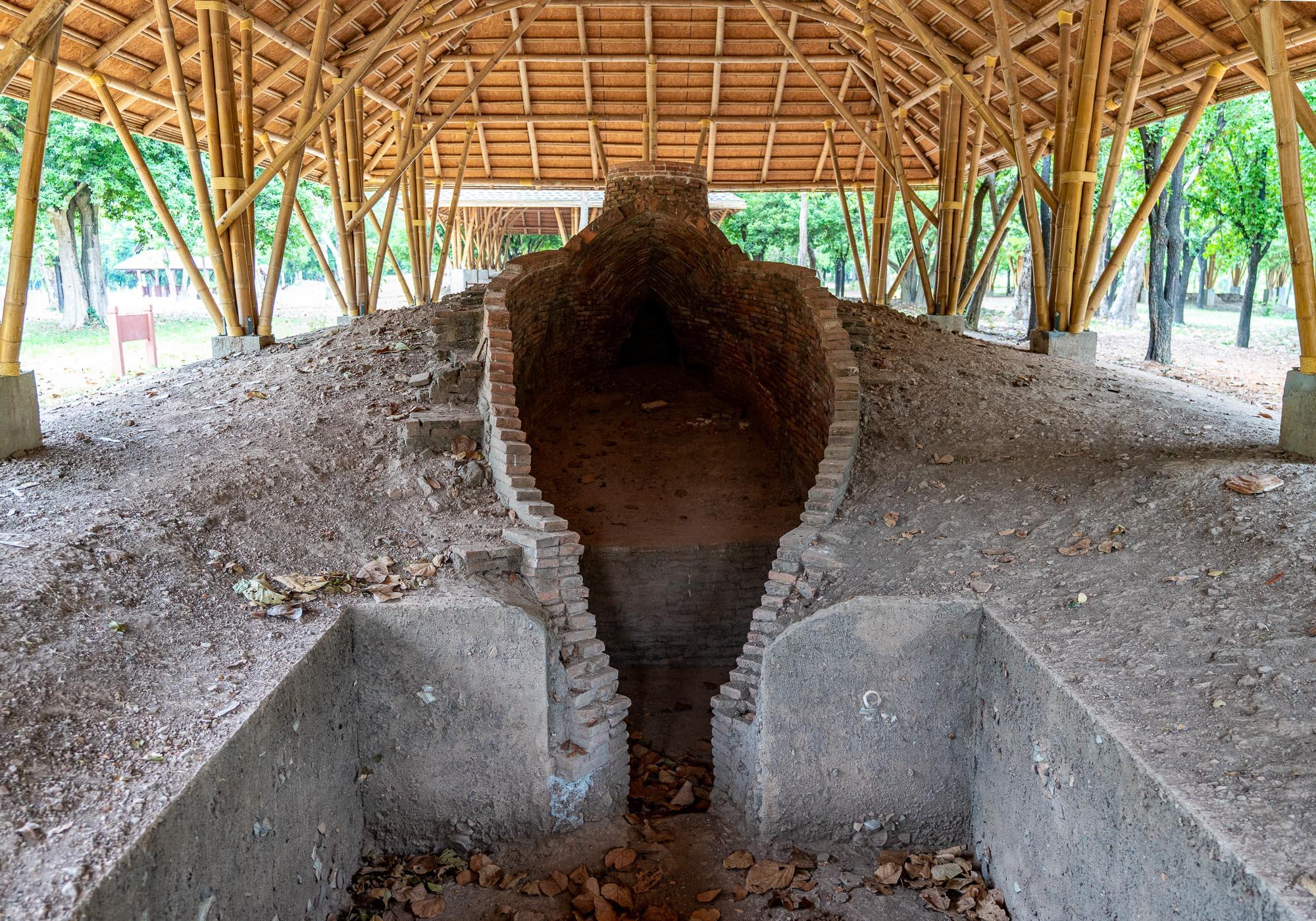 One of the ancient underground kilns at Tao Thu Riang, which has been restored so visitors can see how Sukhothai's ceramics were made. – © Michael Turtle