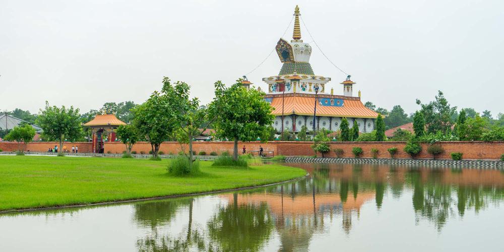 Germany’s Great Lotus Stupa is one of several monasteries that sit around a square lake with a circular island in the middle. – © Michael Turtle