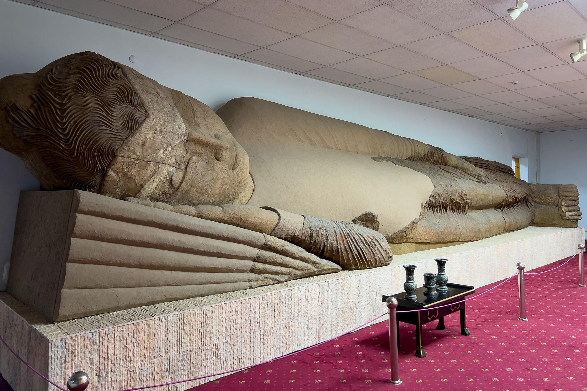 The 12-metre-long statue of a sleeping Buddha in the National Museum of Antiquities of Tajikistan – © Oybek Ostanov / Shutterstock