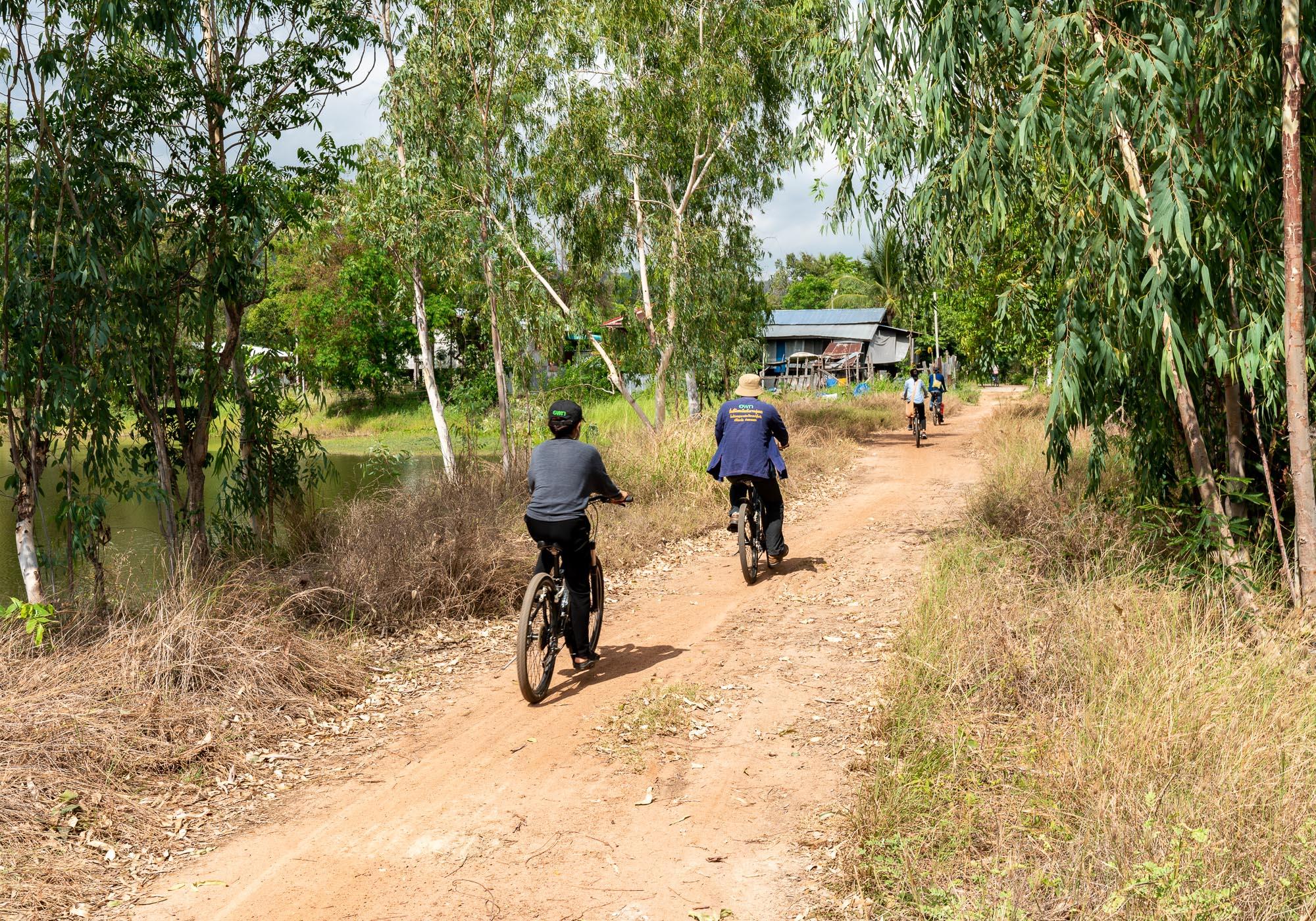 With a bike, visitors are able to take the smaller dirt trails that lead through local communities in the North Zone. – © Michael Turtle