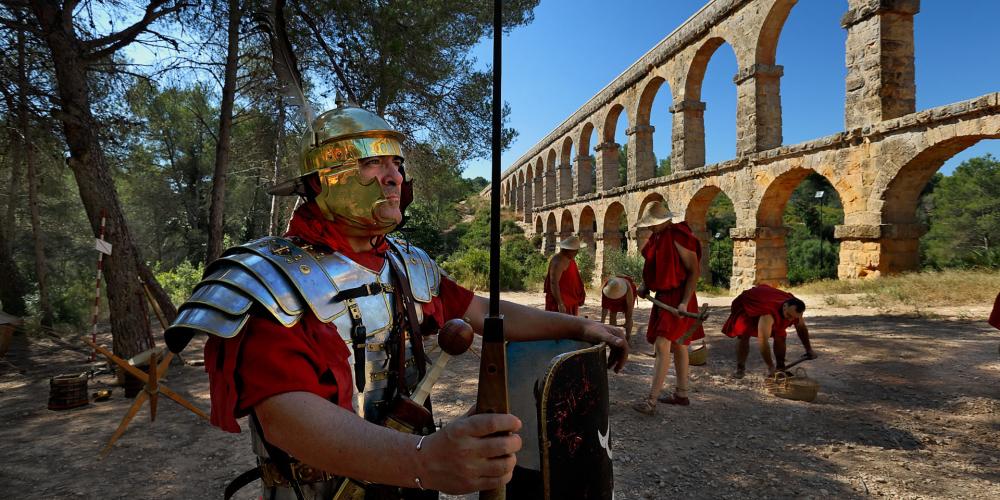 The Pont del Diable (Devil's Bridge) or the "Les Ferreres" Aqueduct—217 metres long and 25 metres high—is only a fragment of a much larger conduit used to supply water from the Francolí River. Here, the archaeological treasure frames Tarraco Viva, recognised as Europe’s most important cultural festival celebrating the Roman era. – © Rafael López-Monné The Pont del Diable (Devil's Bridge) or the "Les Ferreres" Aqueduct—217 metres long and 25 metres high—is only a fragment of a much larger conduit used to supply water from the Francolí River. Here, the archaeological treasure frames Tarraco Viva, recognised as Europe’s most important cultural festival celebrating the Roman era. – © Rafael López-Monné