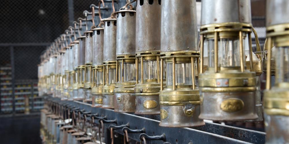 The lamp shop of the Delloye pit at the Historic Mining Centre in Lewarde. The lamp shop was a miner's last stop before descending into the mine, and the first stop at the surface. Tagged with the miner's number, if the lamp was not returned, the miner was missing. – © Jean-Michel André The lamp shop of the Delloye pit at the Historic Mining Centre in Lewarde. The lamp shop was a miner's last stop before descending into the mine, and the first stop at the surface. Tagged with the miner's number, if the lamp was not returned, the miner was missing. – © Jean-Michel André