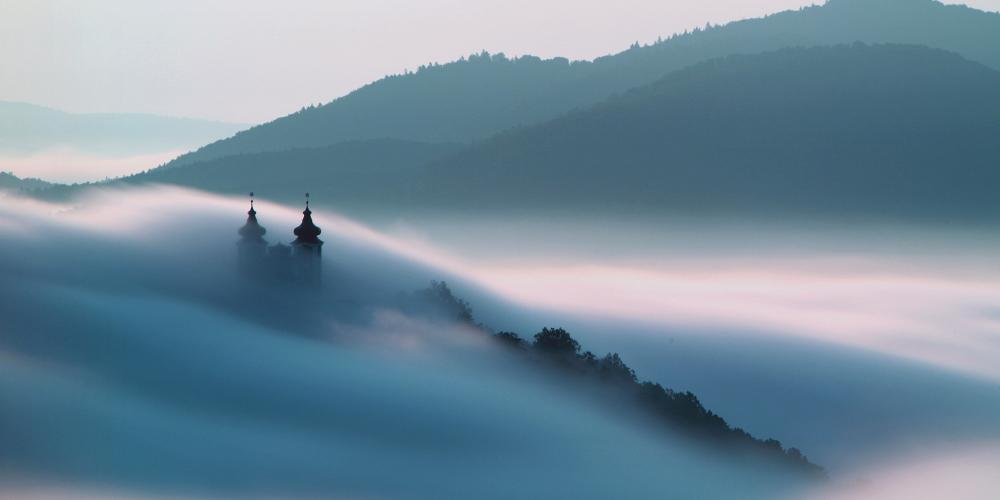 Clouds provide a mysterious atmosphere above the Calvary's Baroque architecture. – © TTstudio / Shutterstock Clouds provide a mysterious atmosphere above the Calvary's Baroque architecture. – © TTstudio / Shutterstock