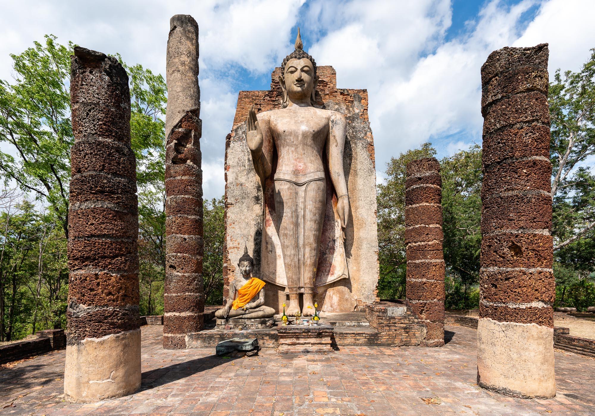 The standing Buddha Statue marks the centre of Wat Saphan Hin where King Ram Khamhaeng would visit to worship on special occasions. – © Michael Turtle