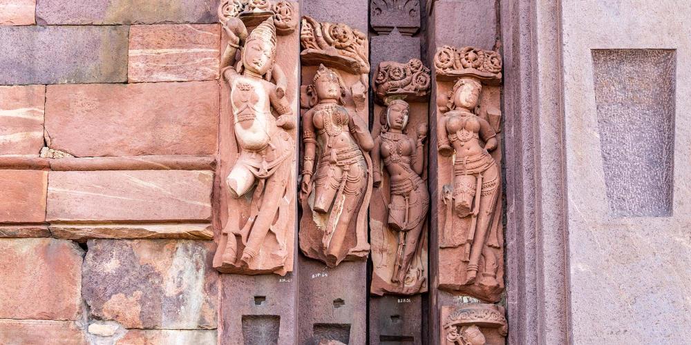 Sculptures on the front of the temple show female spirits, attendants of Shiva, and river goddesses. – © Michael Turtle