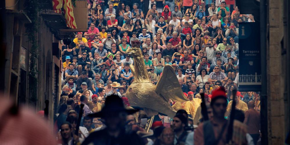 The annual city festival Santa Tecla blends tradition with dances, human towers, spark-throwing nighttime parades, mythological beasts, mediaeval treats, and 'spoken dances'. – © Rafael López-Monné