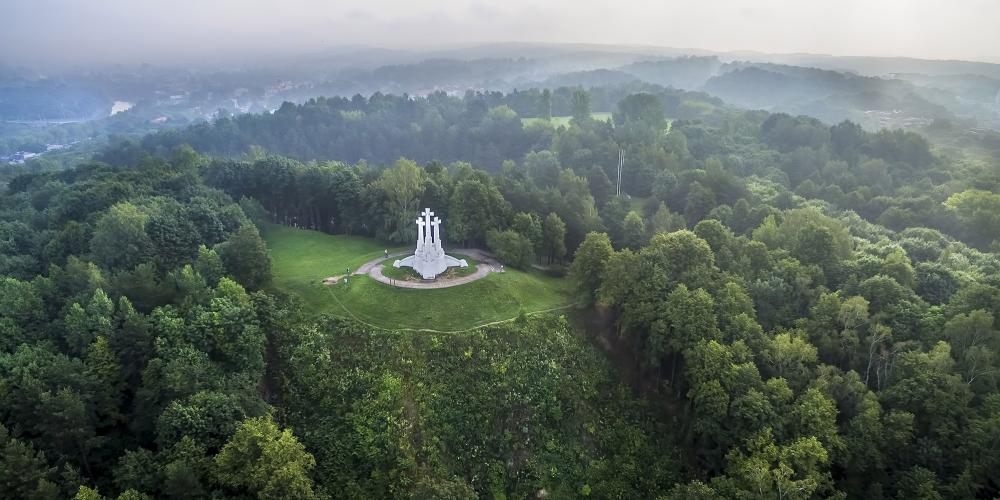 The Lithuanian capital city is decorated with three magnificent white crosses on a high hill. They are the symbol of Vilnius and a monument to the national identity and resistance to the occupation. – © Laimonas Ciūnys