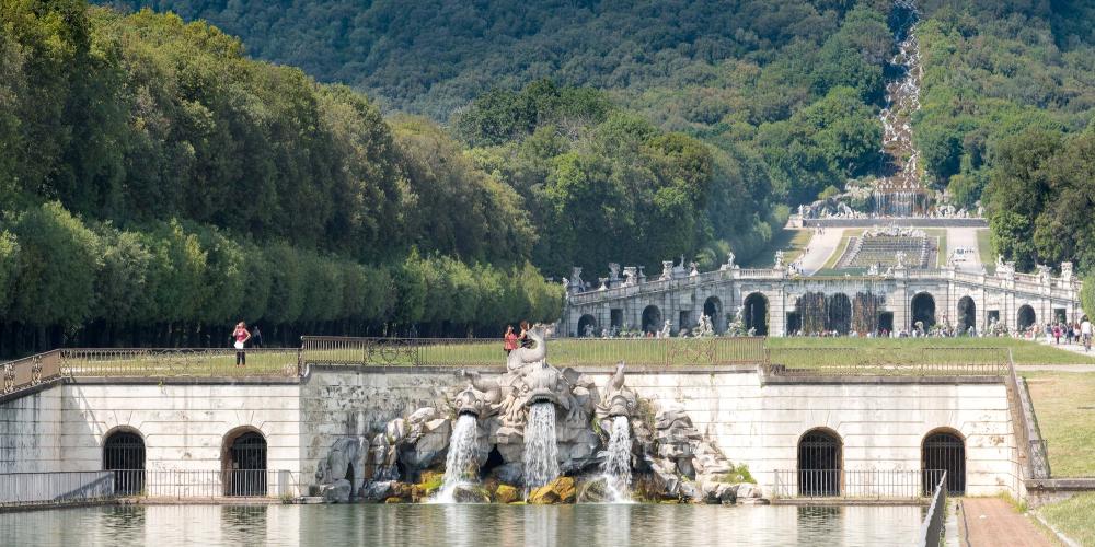 Fontana dei Delfini (Dolphin fountain) and series of cascades, fountains, and basins that extend up the mountain. – © Reggia di Caserta