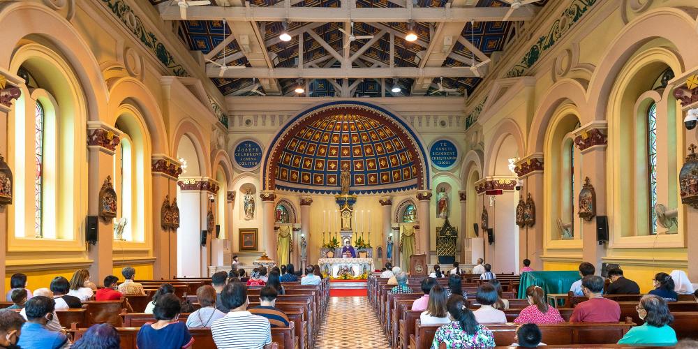 Mass is held inside St Joseph Catholic Church in the French District. – © Michael Turtle Mass is held inside St Joseph Catholic Church in the French District. – © Michael Turtle