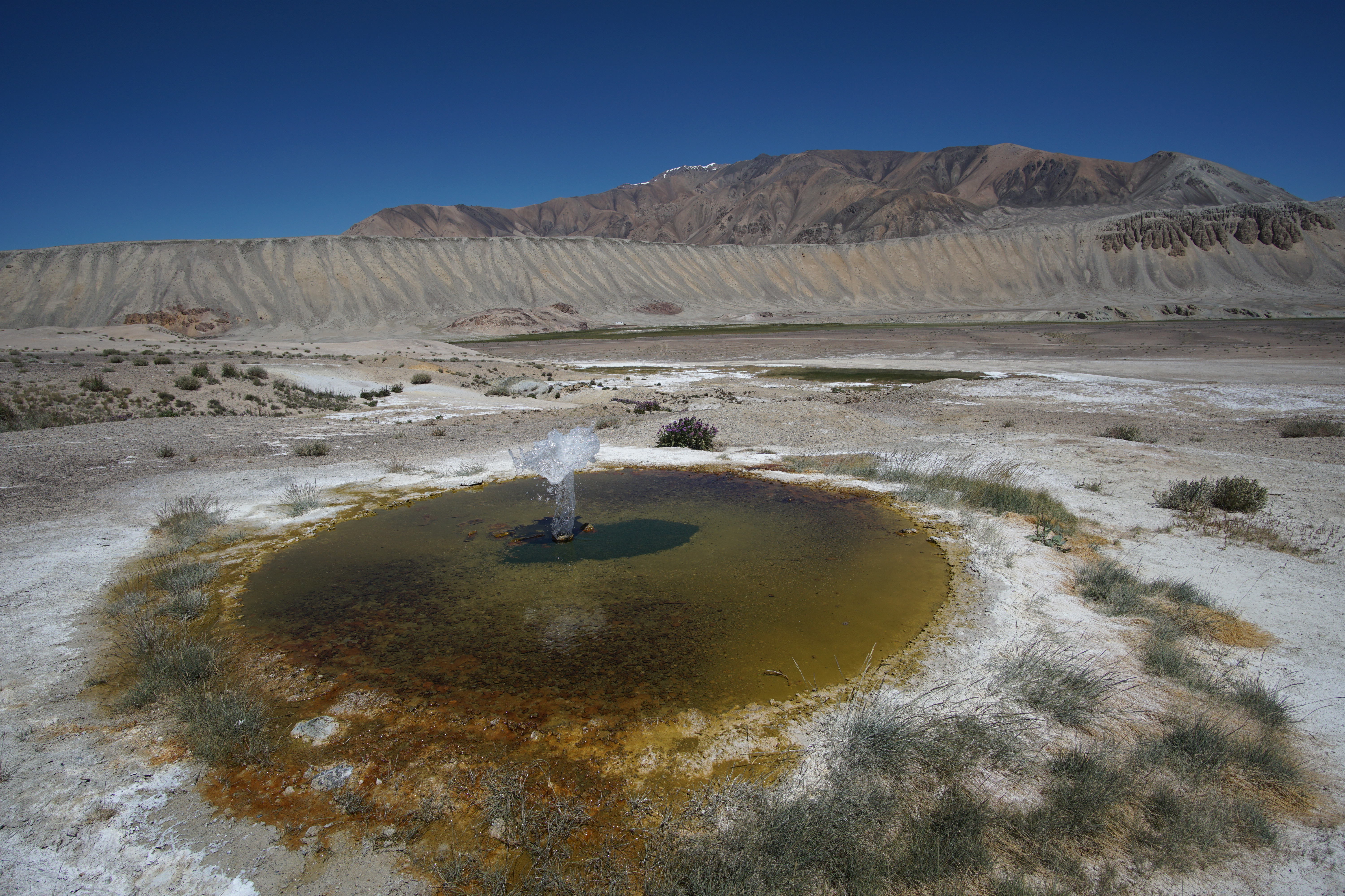 Hot springs geyser in Tajik National Park. – © Cherry Kan