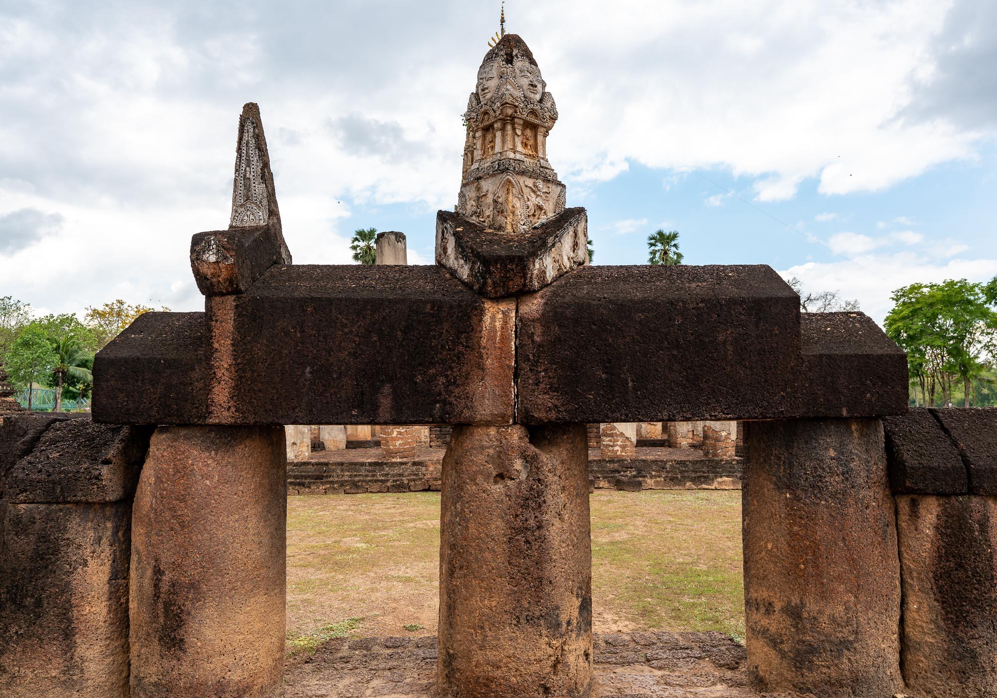 An example of Khmer artistic influences can be see in the images of dancing angels at the top of the gate. – © Michael Turtle