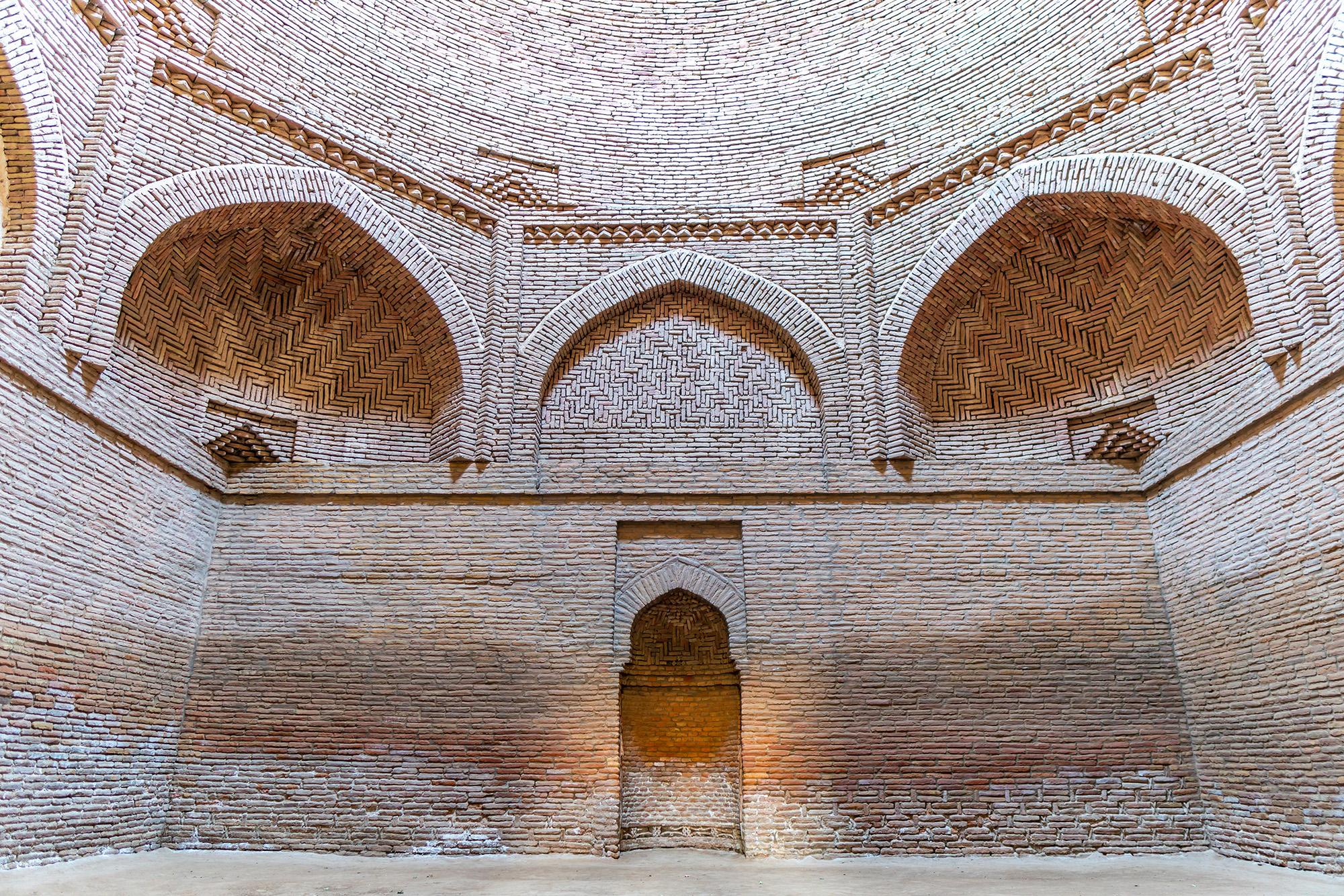 The intricate brick work on one side of the mausoleum – © AlexelA / Shutterstock