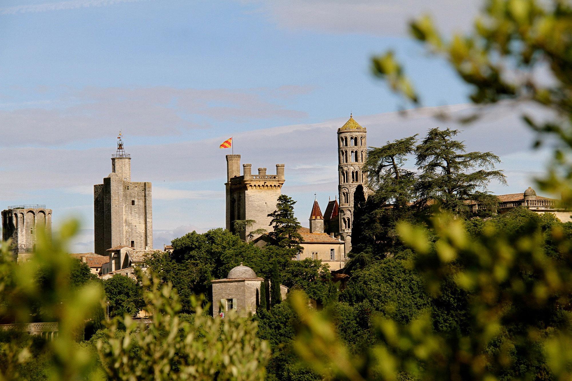 Uzès' three feudal towers. From left to right: the King's tower, the Bishop's tower, Bermonde tower (Duchy's keep) and the Fenestrelle tower. – © City of Uzès