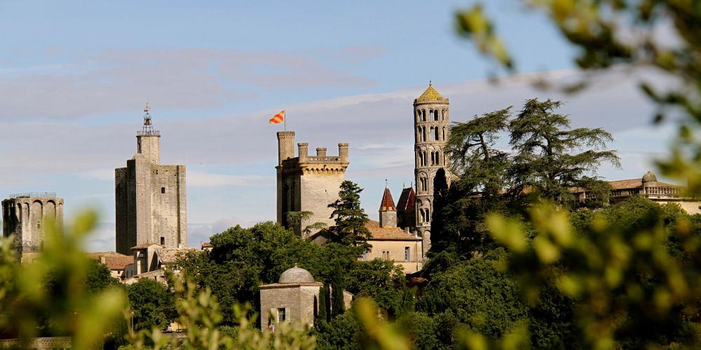 Uzès' three feudal towers. From left to right: the King's tower, the Bishop's tower, Bermonde tower (Duchy's keep) and the Fenestrelle tower. – © City of Uzes