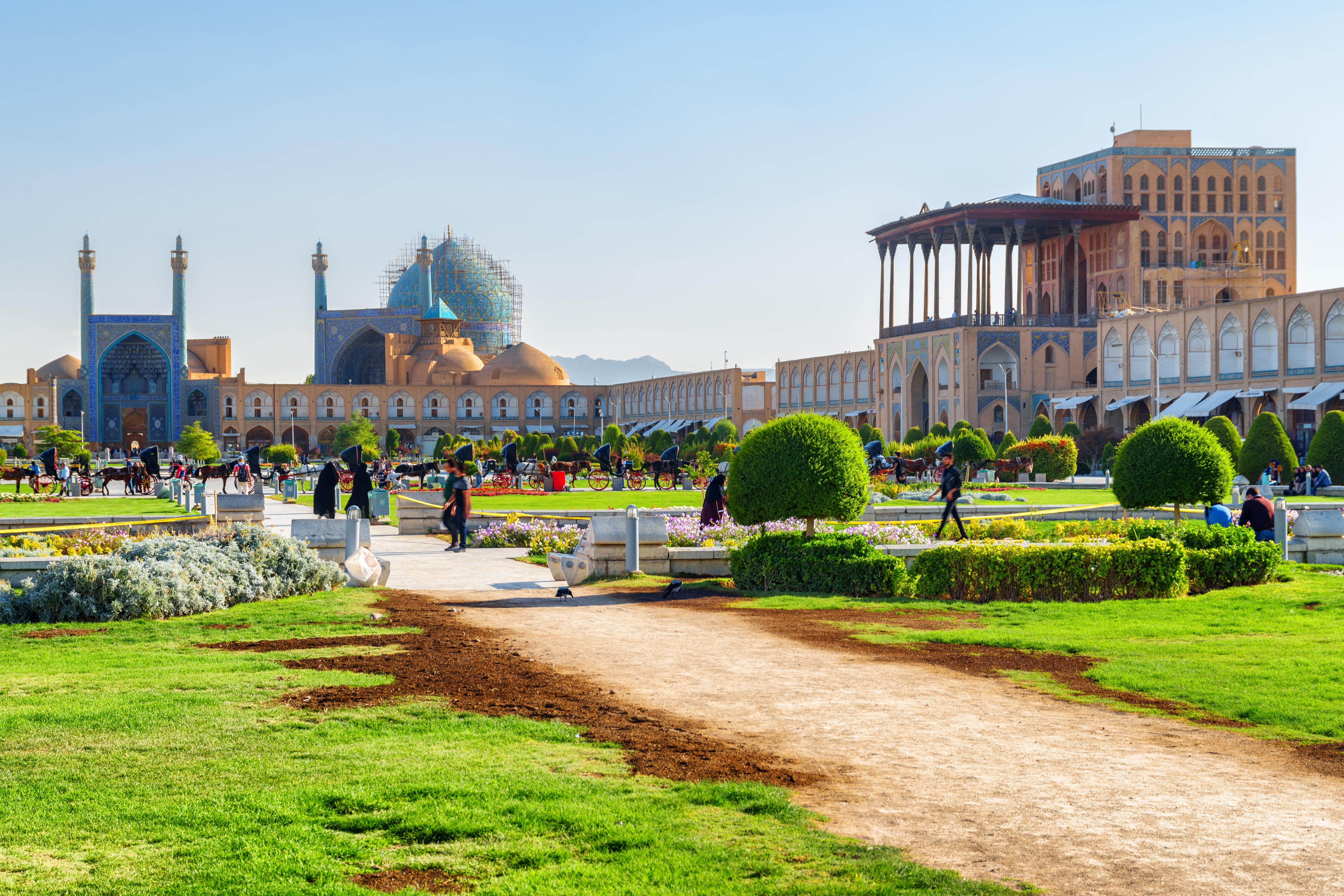The large square is surrounded by historic sites including the impressive Ali Qapu Palace