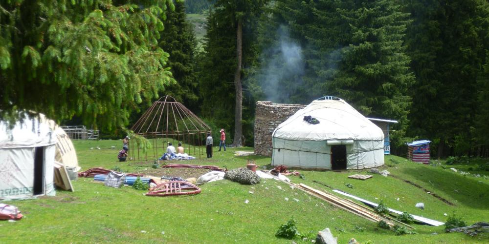 Locals build traditional yurts: portable tents used by nomadic Turkic peoples in Kyrgyzstan – Photo by Helen Turner Locals build traditional yurts: portable tents used by nomadic Turkic peoples in Kyrgyzstan – Photo by Helen Turner