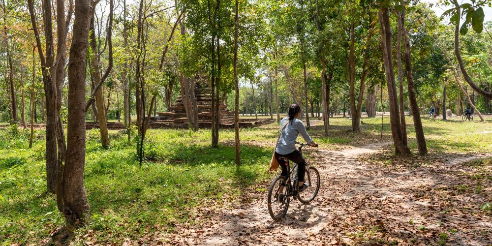 Taking the dirt paths off the main roads leads visitors to some of the temple ruins hidden amongst the forest. – © Michael Turtle