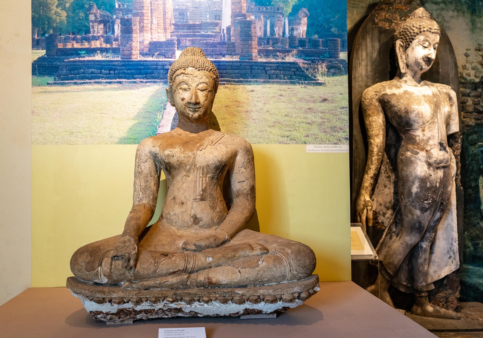 A stucco statue of Buddha subduing Mara from the 14th-15th century that was found in Si Satchanalai. – © Michael Turtle