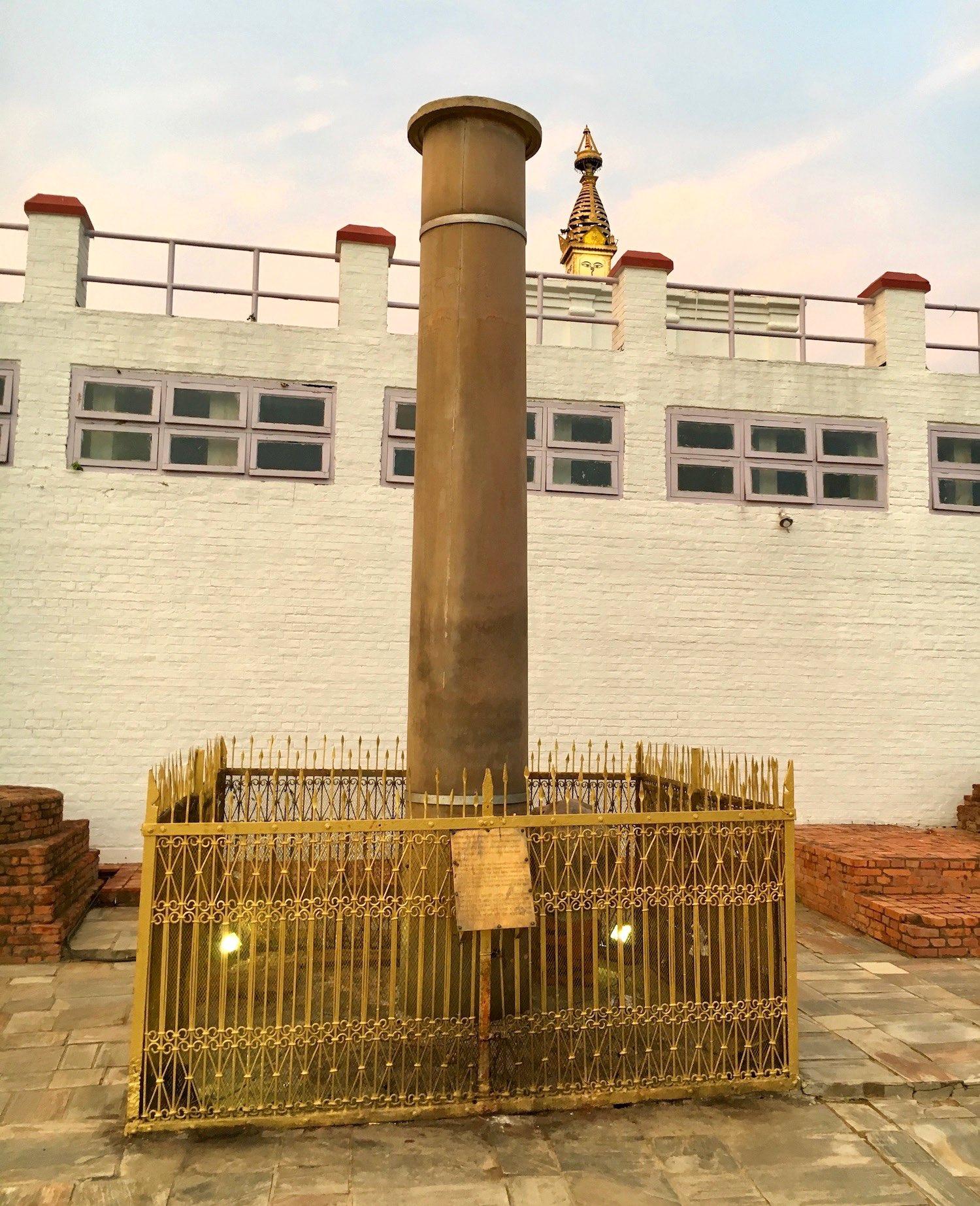 The Asoka Pillar is one of the most important parts of the Sacred Garden. It was erected here in 249 BCE by Emperor Asoka to mark the birthplace of the Buddha. – © Frank Biasi