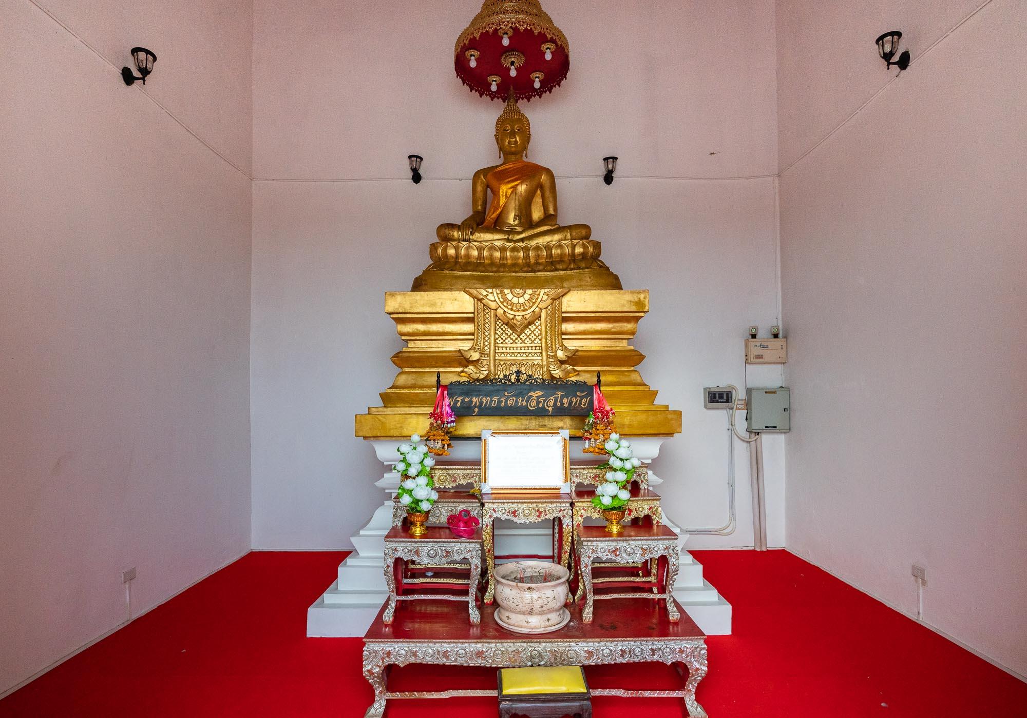 The 14th-century bronze statue known as Phra Phuttha Ratanasiri Sukhothai, which was found submerged in the waters of the Yom River in 2003. – © Michael Turtle