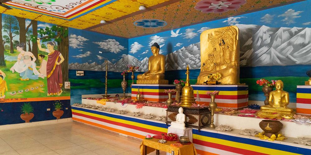 In the centre of the large marble Royal Thai Monastery is a small and quiet place for worship. – © Michael Turtle