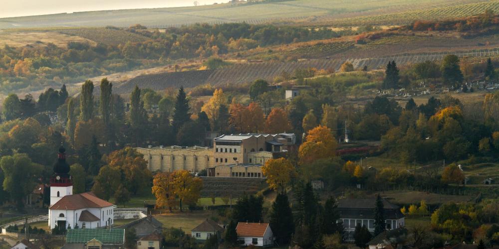 View of Tolcsva from Castle hill. In front of the Oremus Winery is the oldest building in the village, the quite rare Gothic-style Roman Catholic church (built in the 14th century). – © István Mészáros