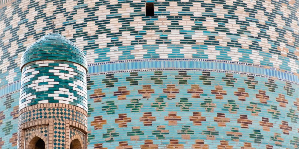 Bricks in different colors and shades of blue, forming patterns at Madrasah Muhammad Amin-Khan, Khiva, Uzbekistan – © Aydin Hassan / Shutterstock Bricks in different colors and shades of blue, forming patterns at Madrasah Muhammad Amin-Khan, Khiva, Uzbekistan – © Aydin Hassan / Shutterstock