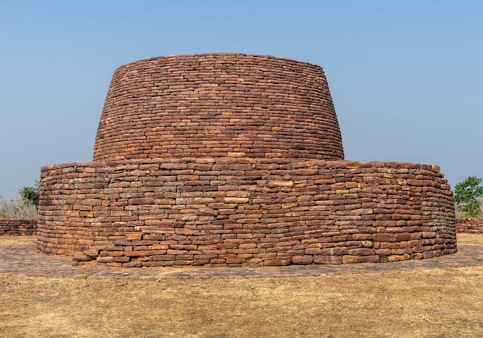 The main stupa at Sonari, which is about 15 metres in diameter and has an elevated walkway that is accessible with a set of stairs. – © Michael Turtle