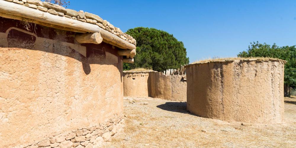 Constructed replicas of houses dating back to the Chalcolithic period (3900-2500BC). – © Michael Turtle