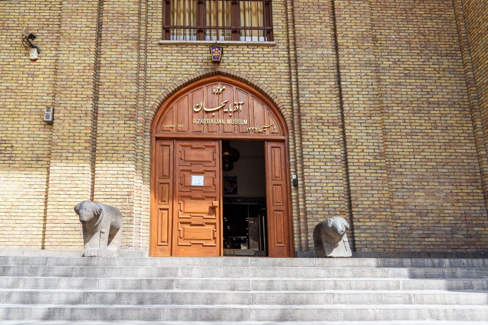 Two ancient statues flank the entrance of the museum © Elena Odareeva / Shutterstock