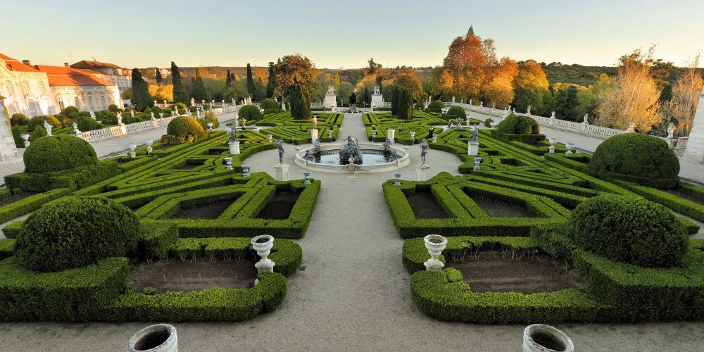 With French influences in their design, the gardens of Queluz are brought to life by water features and statues inspired by classical mythology – © PSML / EMIGUS