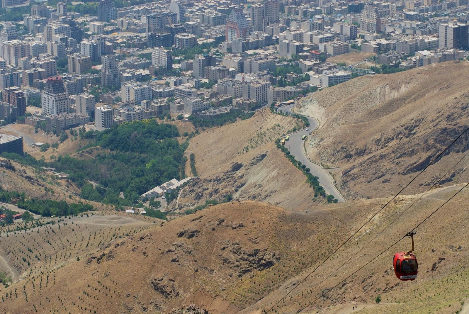 A cable car over a city in Iran
