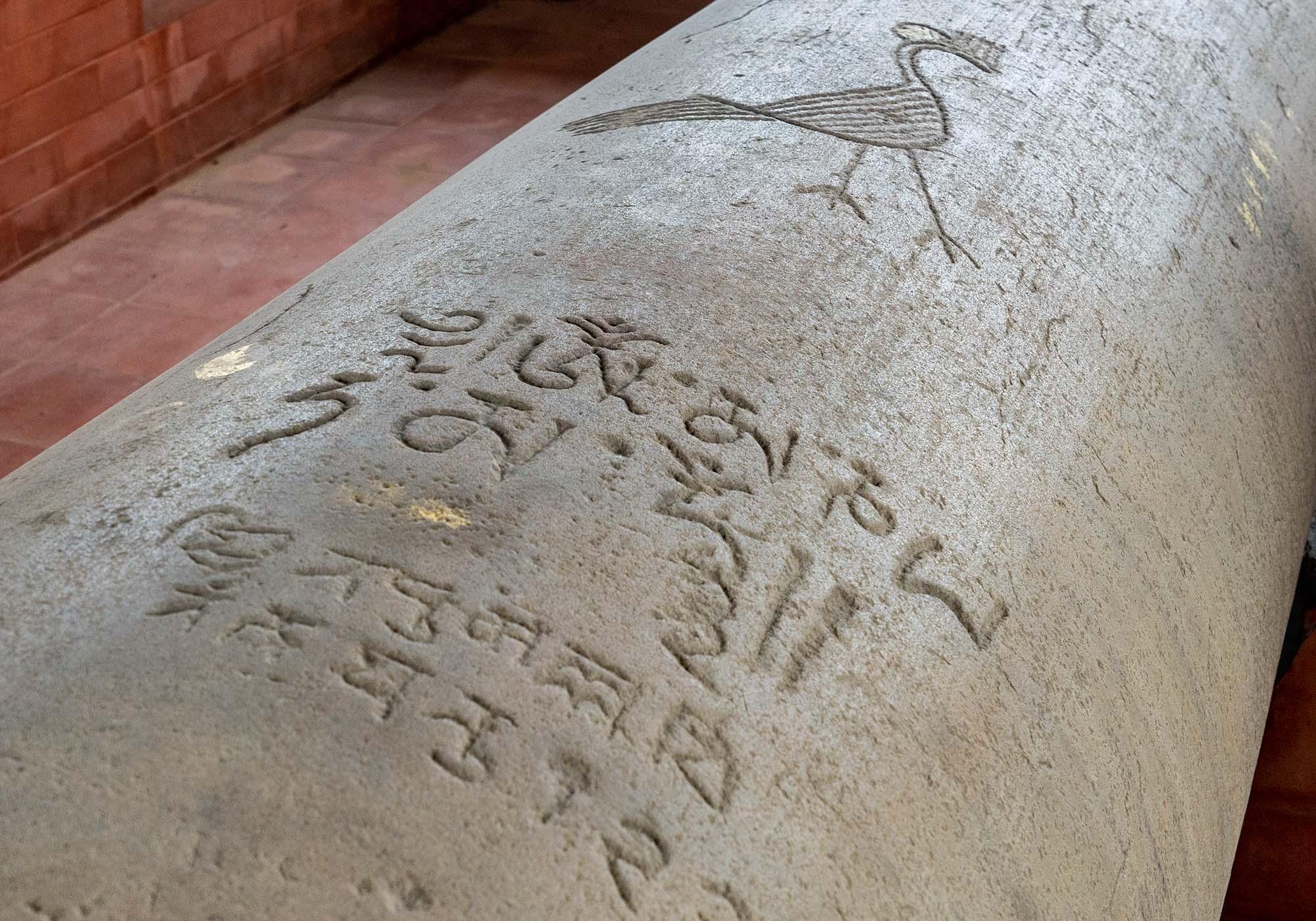 The pillar at Niglihawa was erected in 249 BC by Emperor Asoka to mark his visit here. The text is in Brahmi script and Pali language. – © Michael Turtle