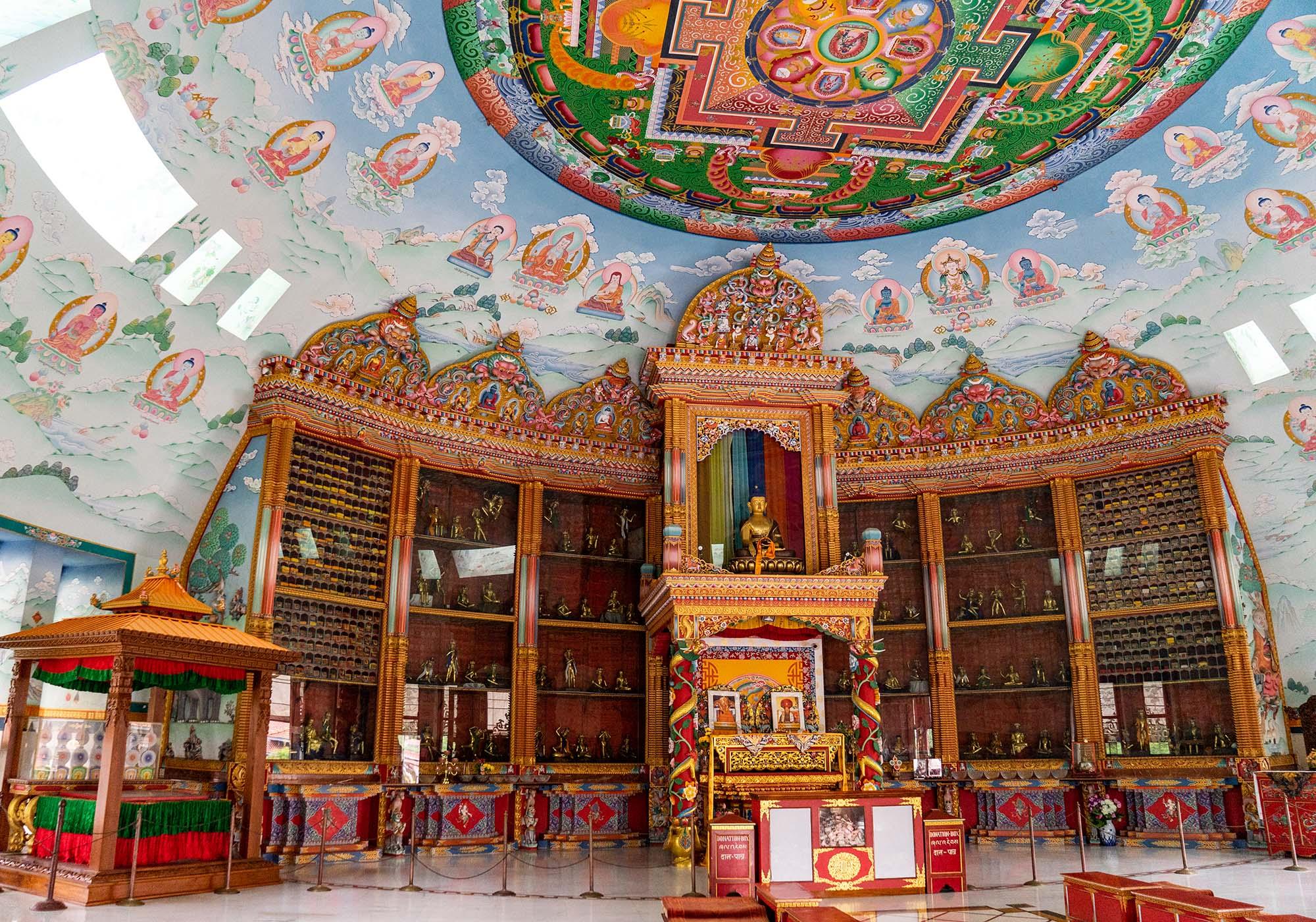 The colourful decorations inside the Great Lotus Stupa are one of the highlights of the West Monastic Zone. – © Michael Turtle