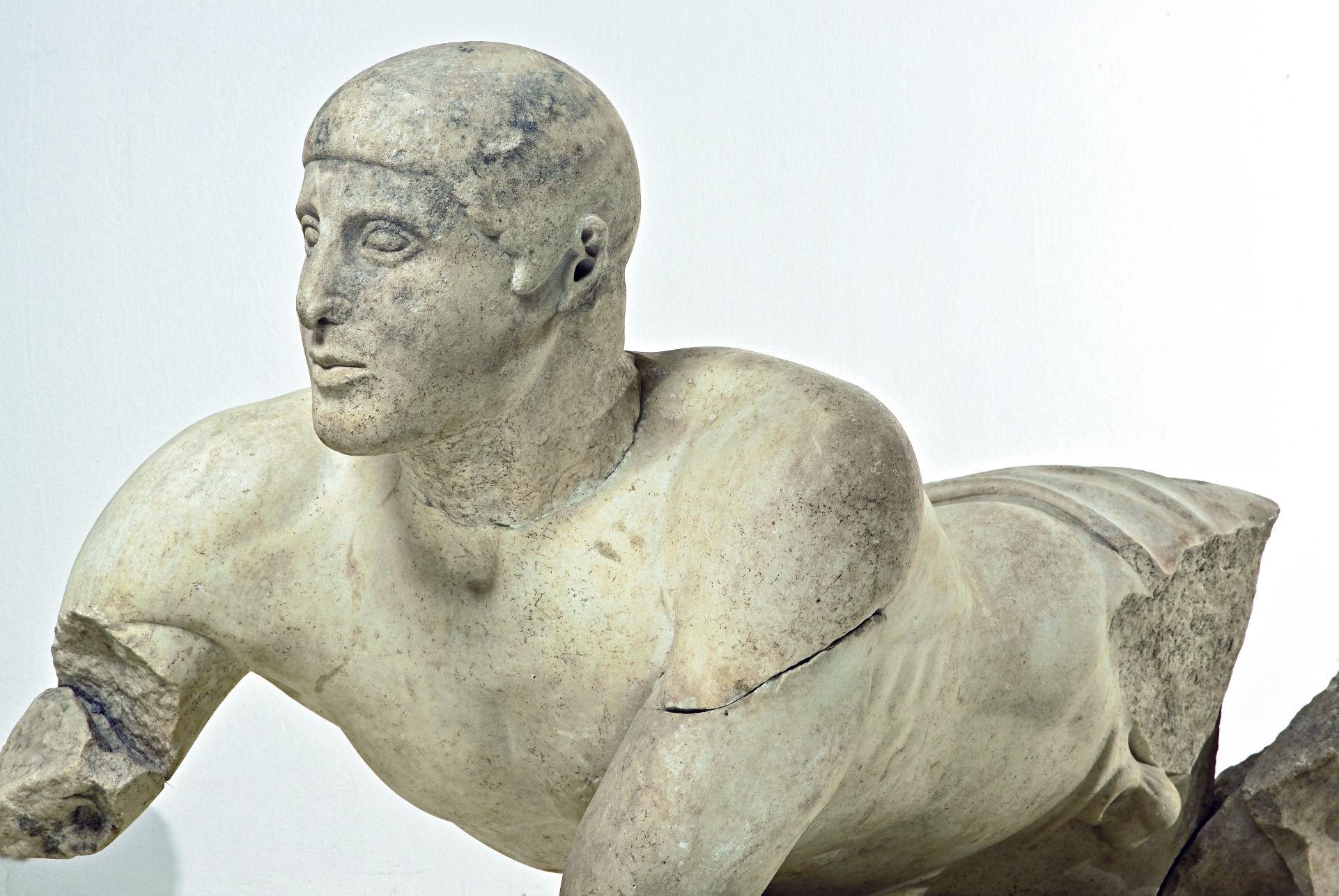 The reclining male figure of the east pediment of the temple of Zeus (Archaeological Museum of Olympia) represents the river Alpheios. – © Hellenic Ministry of Culture and Sports / Ephorate of Antiquities of Ilia