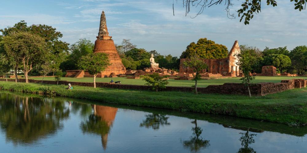Numerous historic temples can be found within the main island of Ayutthaya, some with the original canals still flowing past them. – © Michael Turtle