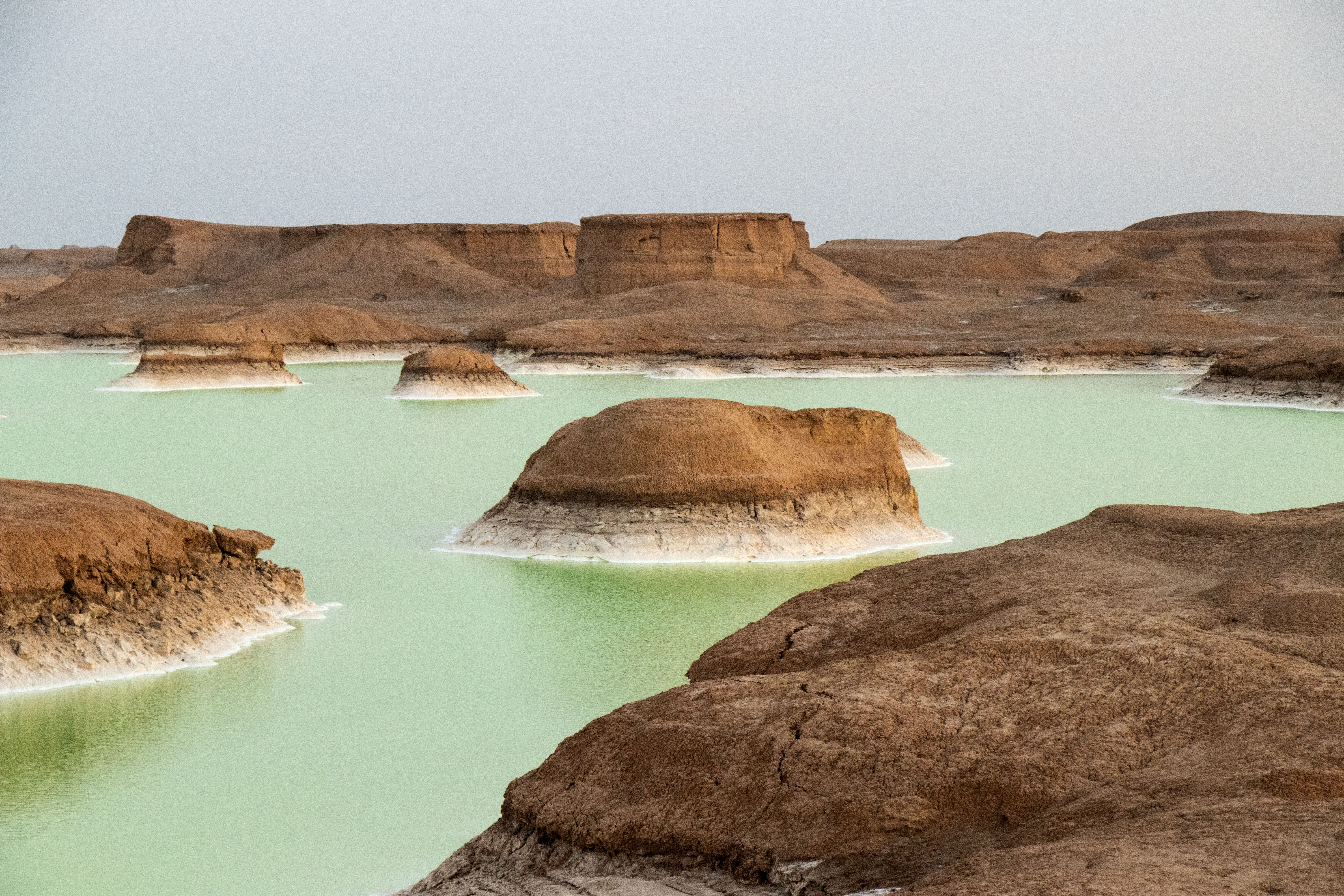 Small yardangs surrounded by river Shur. – © Mehran Maghsoudi Small yardangs surrounded by river Shur. – © Mehran Maghsoudi
