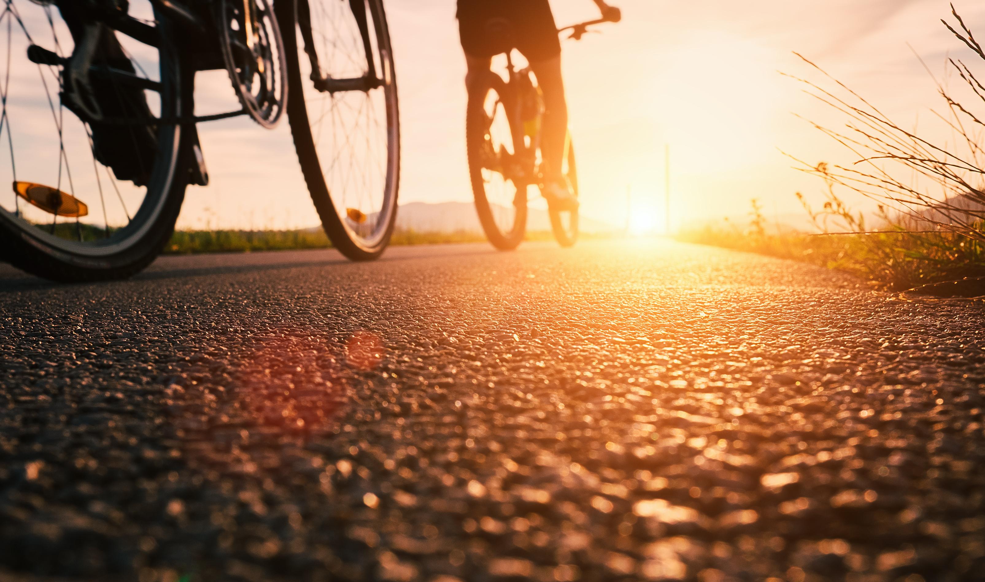 Biking into the sunset © Soloviova Liudmyla / Shutterstock