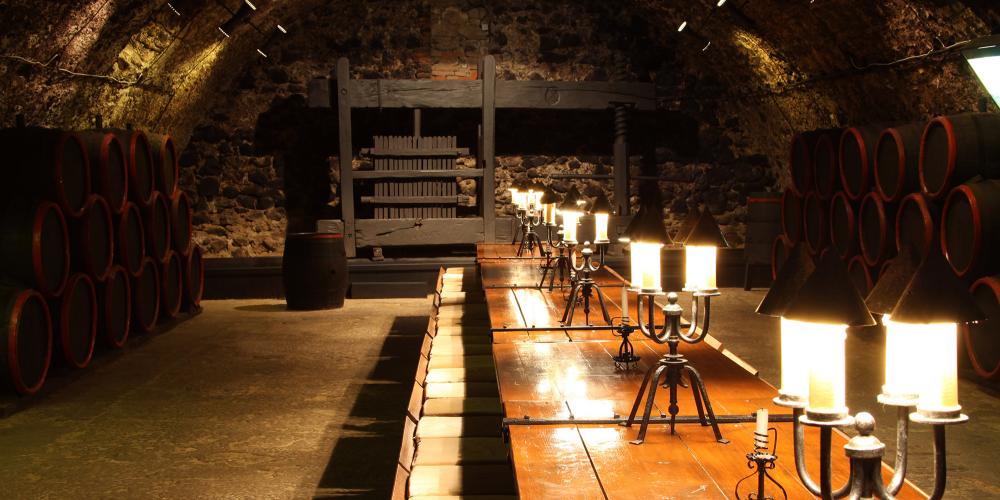 The biggest cellar room in the Tokaj region, called the Hall of Knights of the
Tokaji Rákóczi Cellar. Aristocrats and noble people used to gather here
together for important discussions, elections and of course to enjoy the
famous Tokaji Aszú wine. – © István Meszaros The biggest cellar room in the Tokaj region, called the Hall of Knights of the
Tokaji Rákóczi Cellar. Aristocrats and noble people used to gather here
together for important discussions, elections and of course to enjoy the
famous Tokaji Aszú wine. – © István Meszaros