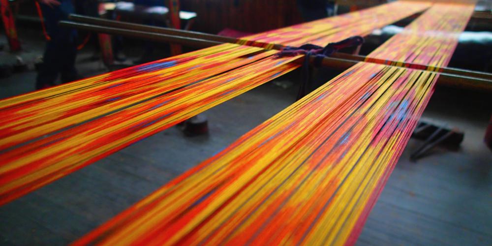 Traditional colourful silk weaving – Photo by Helen Turner