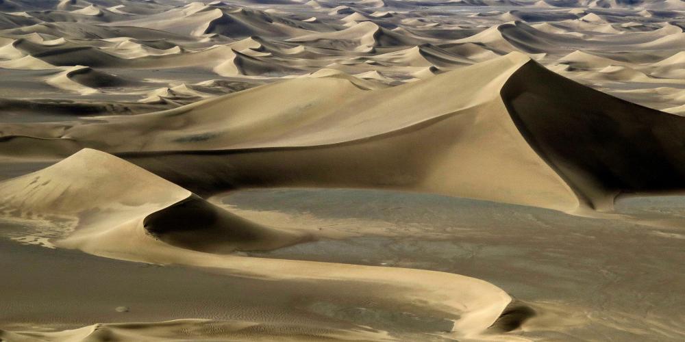 Air view of Lut Desert's sand dunes. – © Mehran Maghsoudi Air view of Lut Desert's sand dunes. – © Mehran Maghsoudi