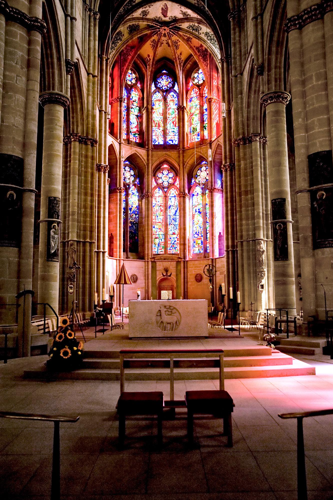 The splendid altar and stained glass of the Church of Our Lady