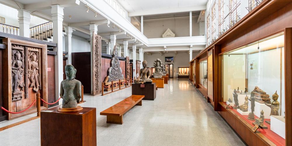 The ground floor of the Chao Sam Phraya National Museum has a collection of statues, wooden gables, ceramics, and other artworks. – © Michael Turtle