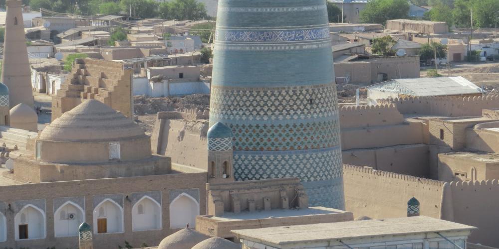 Kalta Minor Minaret aerial view at Itchan Kala, the walled inner town of the city of Khiva in Uzbekistan – Photo by Helen Turner Kalta Minor Minaret aerial view at Itchan Kala, the walled inner town of the city of Khiva in Uzbekistan – Photo by Helen Turner