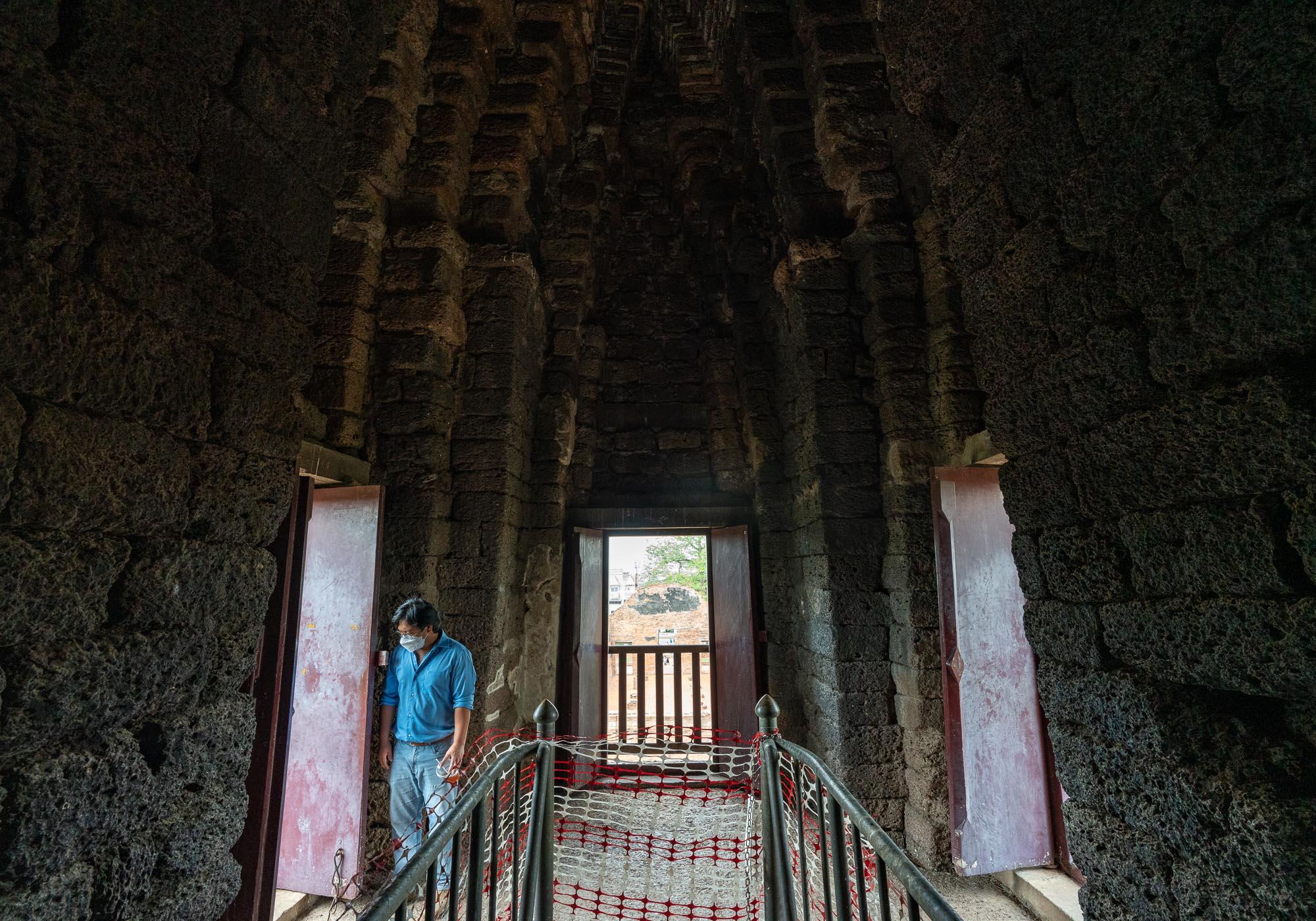 Inside the central prang of Wat Ratchaburana, with the three-level crypt where the treasures were found below. – © Michael Turtle