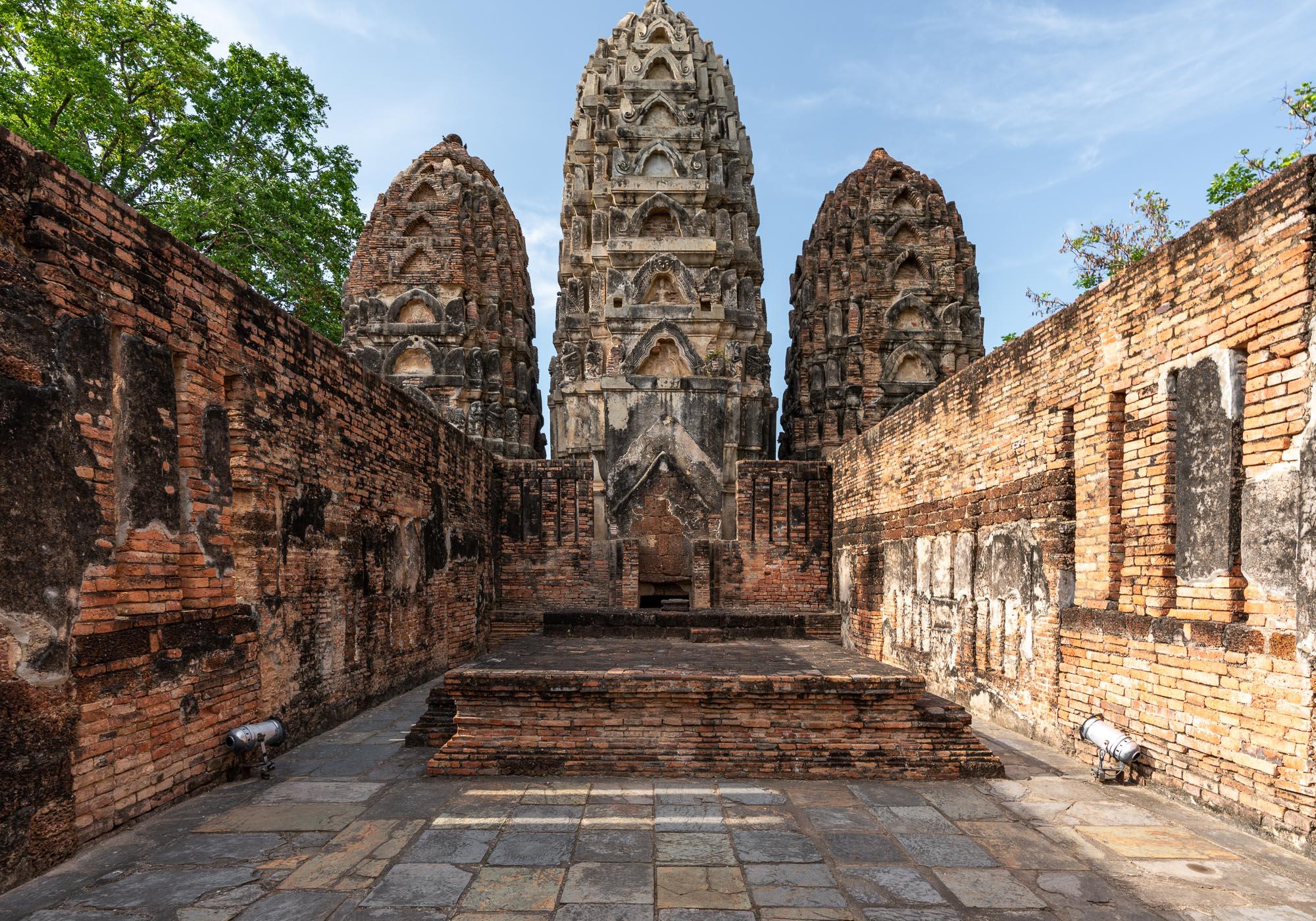 The three towers of Wat Si Sawai are similar in design to the Khmer temples at Angkor in Cambodia, with seven levels on each one. – © Michael Turtle
