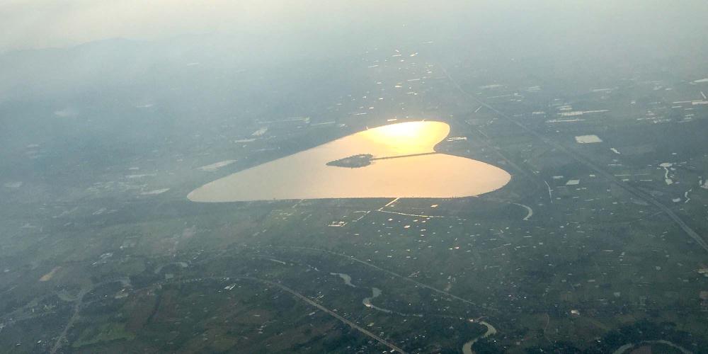 The heart-shaped reservoir and island, as seen from the air. – © Duong Bich Hanh